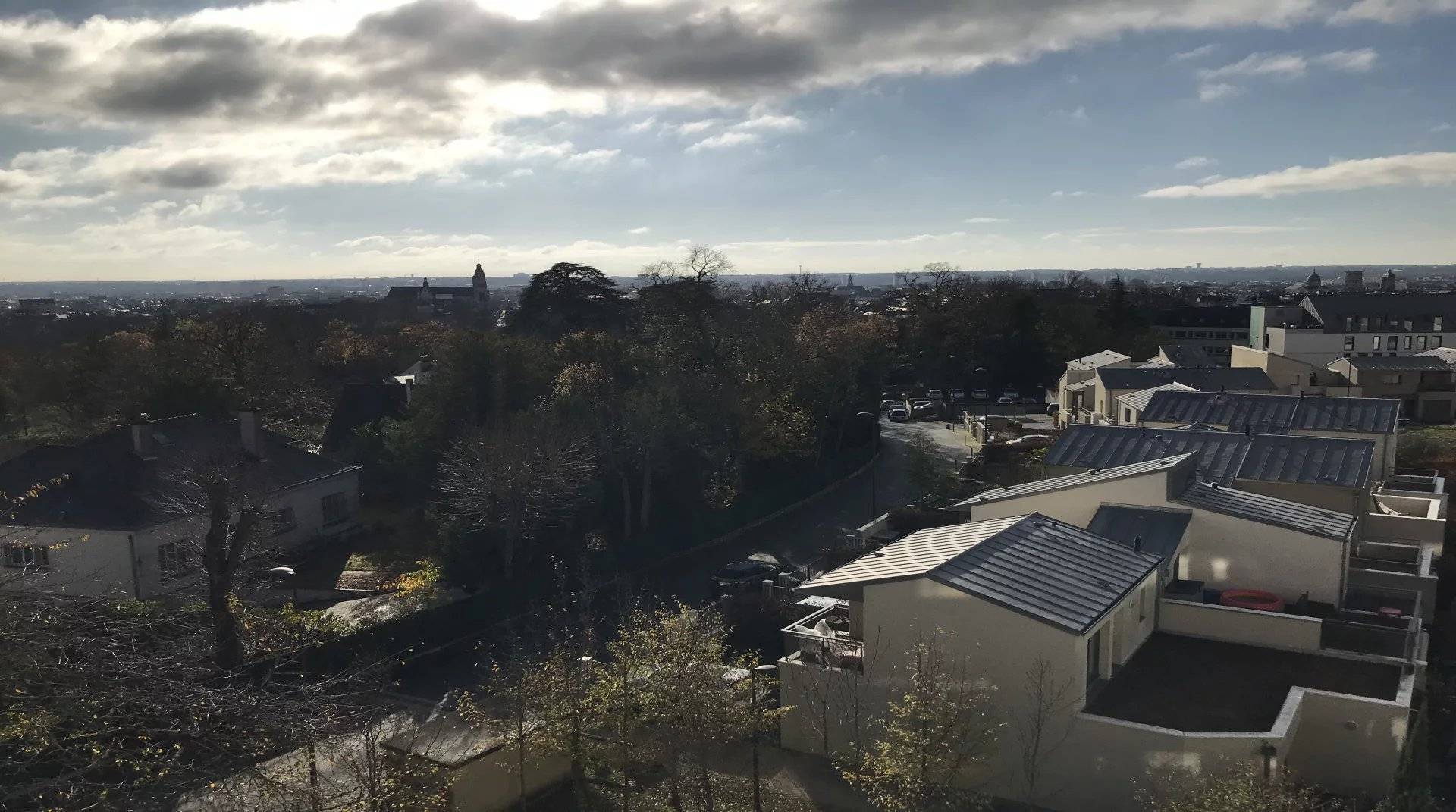 Panoramic view over the rooftops of Tours from a terrace